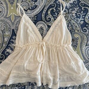 Women's Cream Lace-Trim Peplum Tank Top